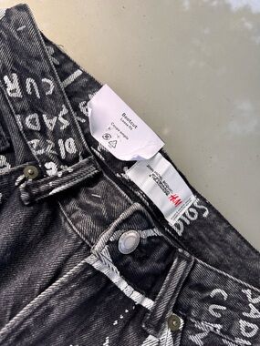 H&M wide leg jeans with art work from the late Jean M. Basquiat.